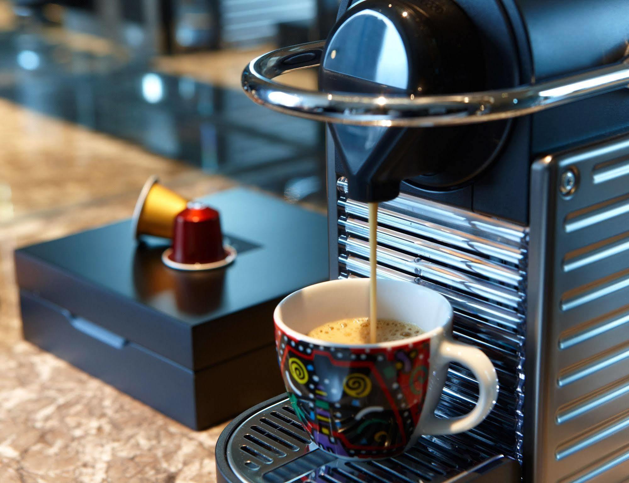 Humble House Taipei, Curio Collection By Hilton Hotel Kültér fotó A Nespresso machine